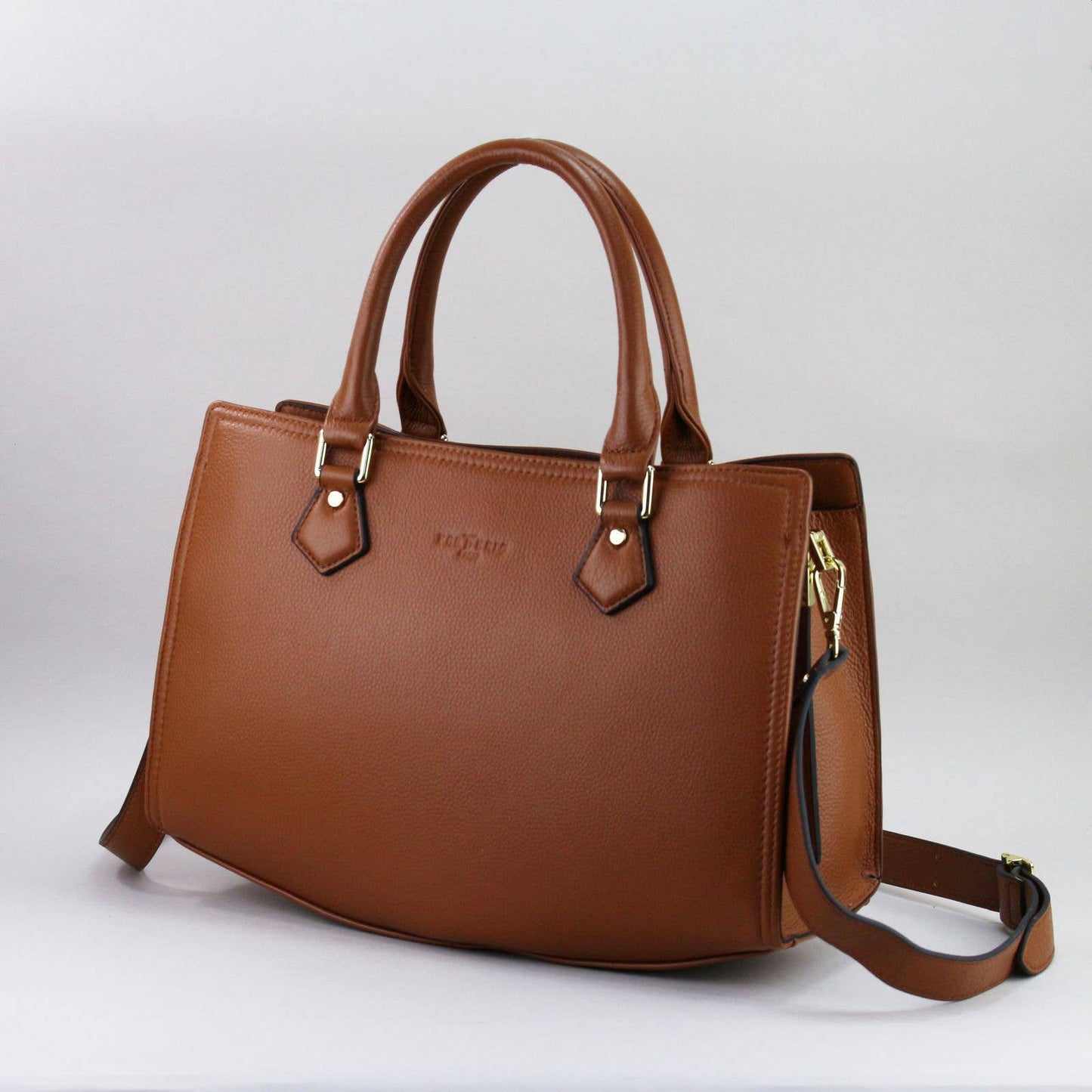 Brown leather laptop handbag with silver accents on a light grey background