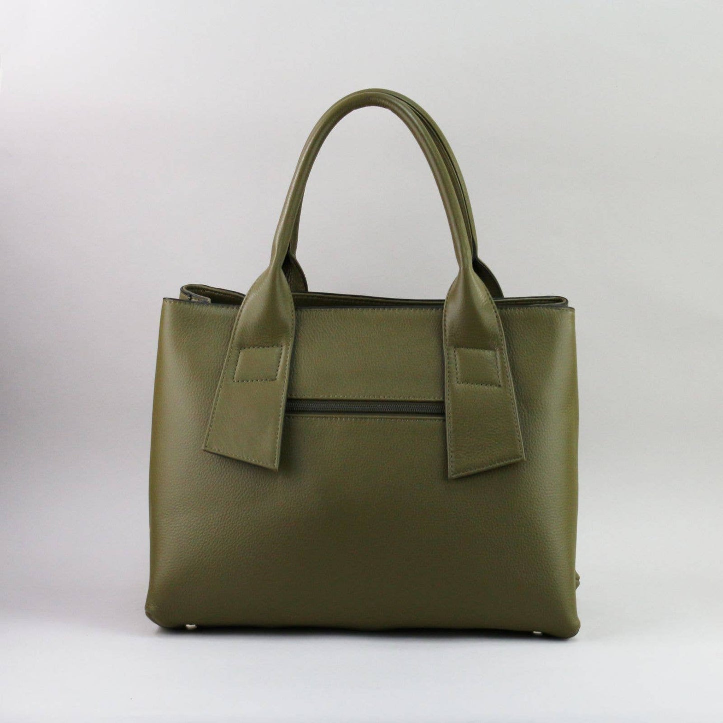 Green leather laptop handbag with a plain background