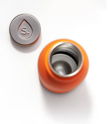 An orange 350ml water bottle. Bottle 2.0 with a stainless steel cap