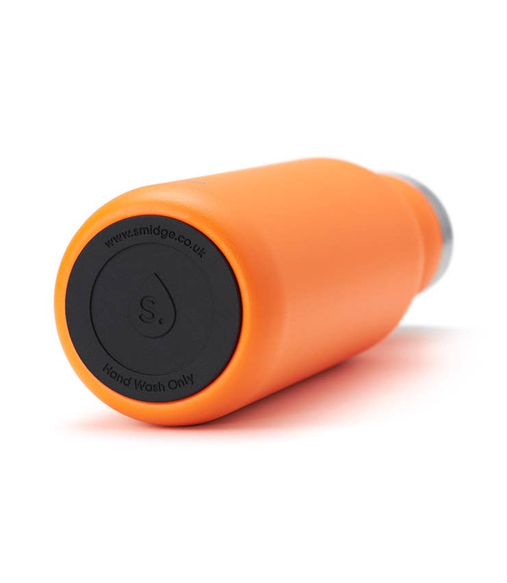 An orange 350ml water bottle. Bottle 2.0 with a stainless steel cap