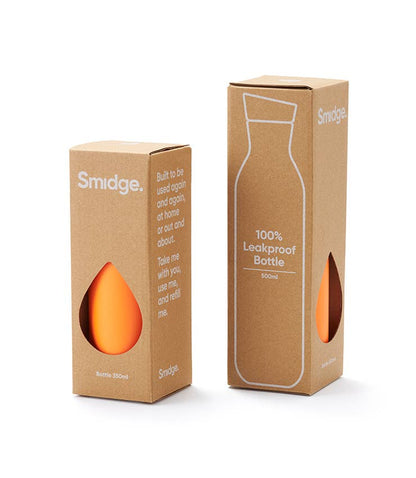 Two different sized water bottles in brown packaging