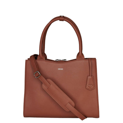 A cognac brown leather laptop handbag with a structured design, featuring two handles and a removable shoulder strap