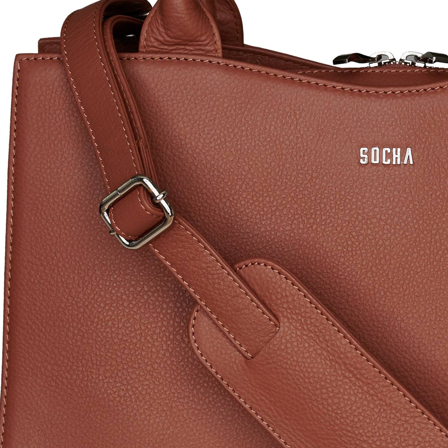 A cognac brown leather laptop handbag with a structured design, featuring two handles and a removable shoulder strap