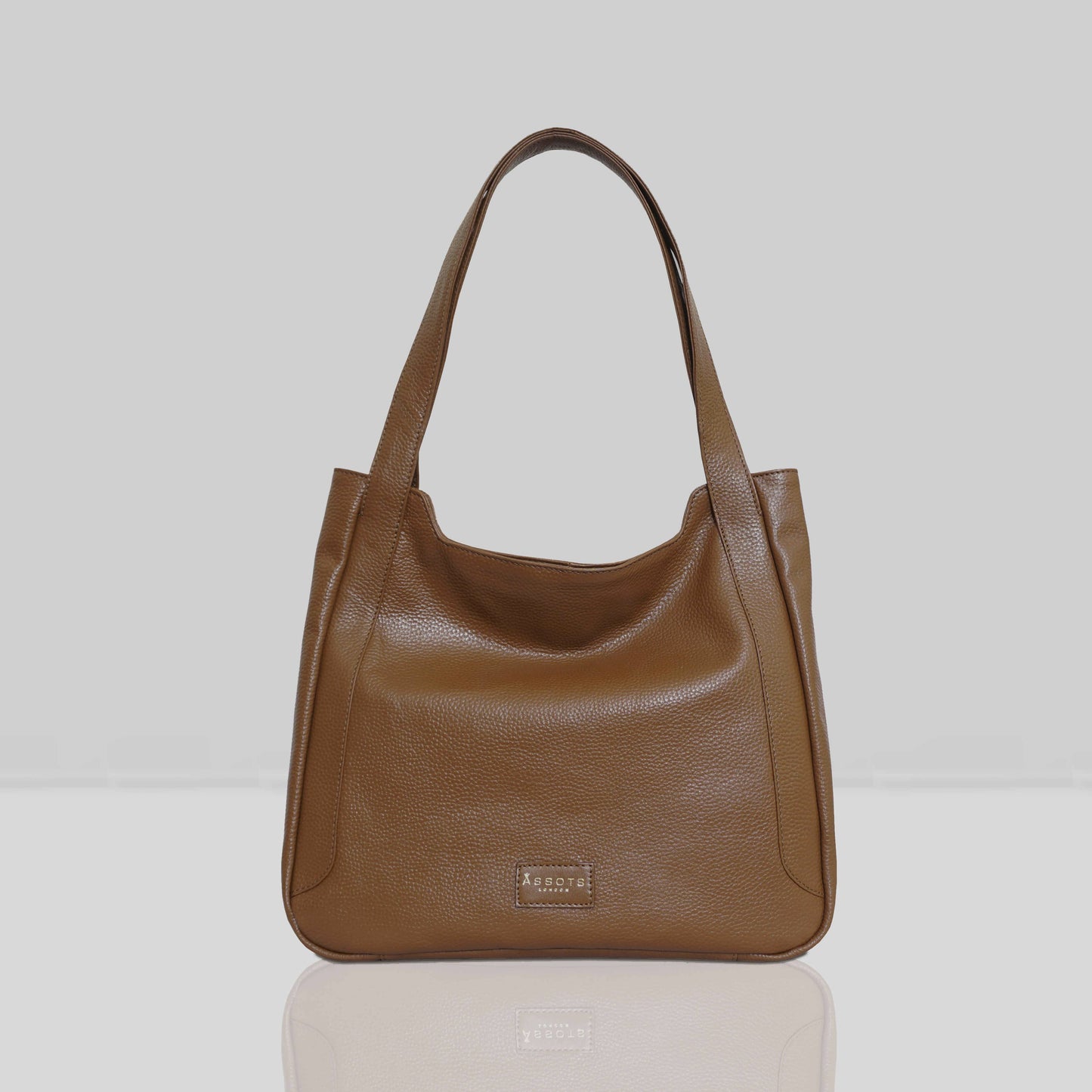 Brown leather laptop handbag on a white background