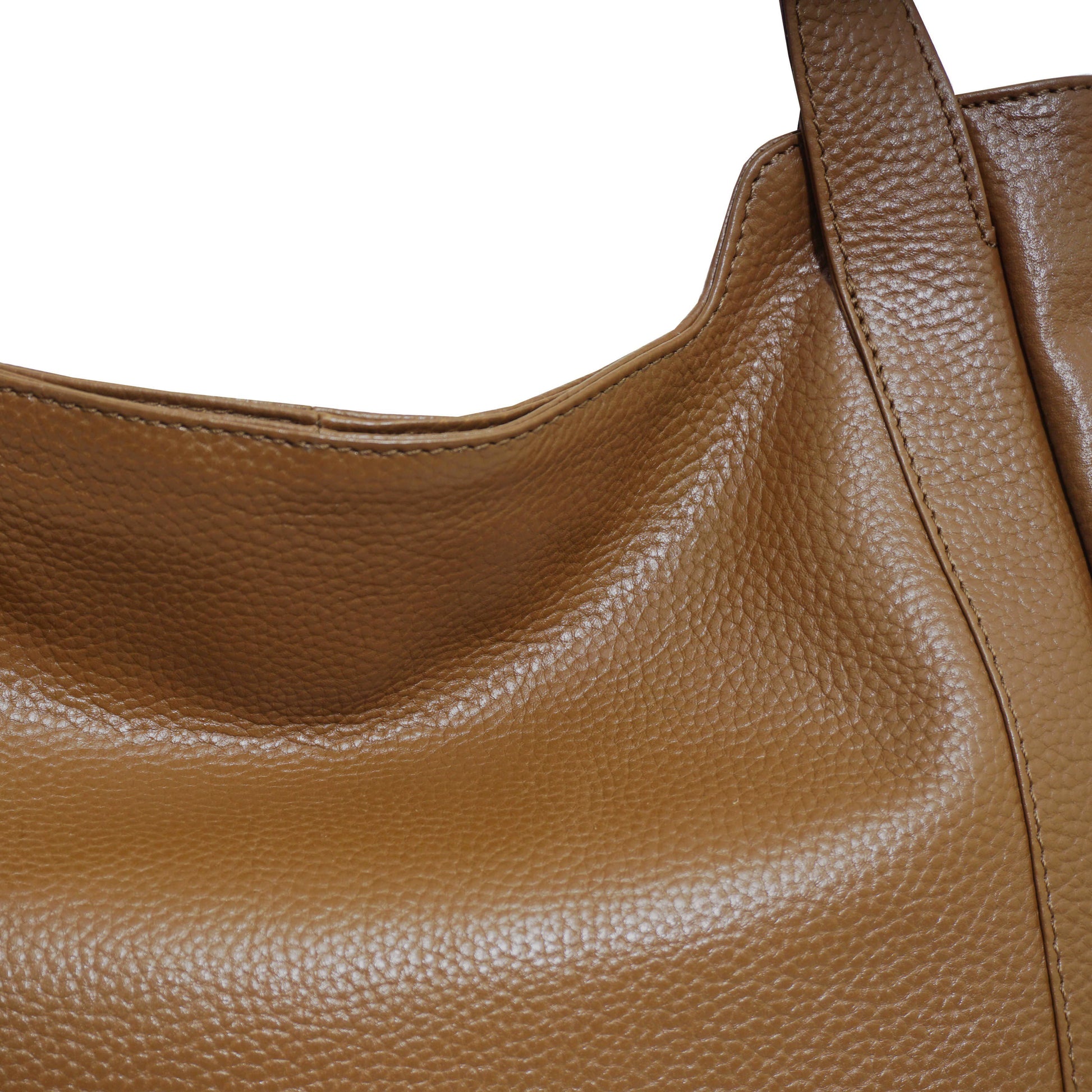 Close-up of a brown leather laptop handbag with a white background