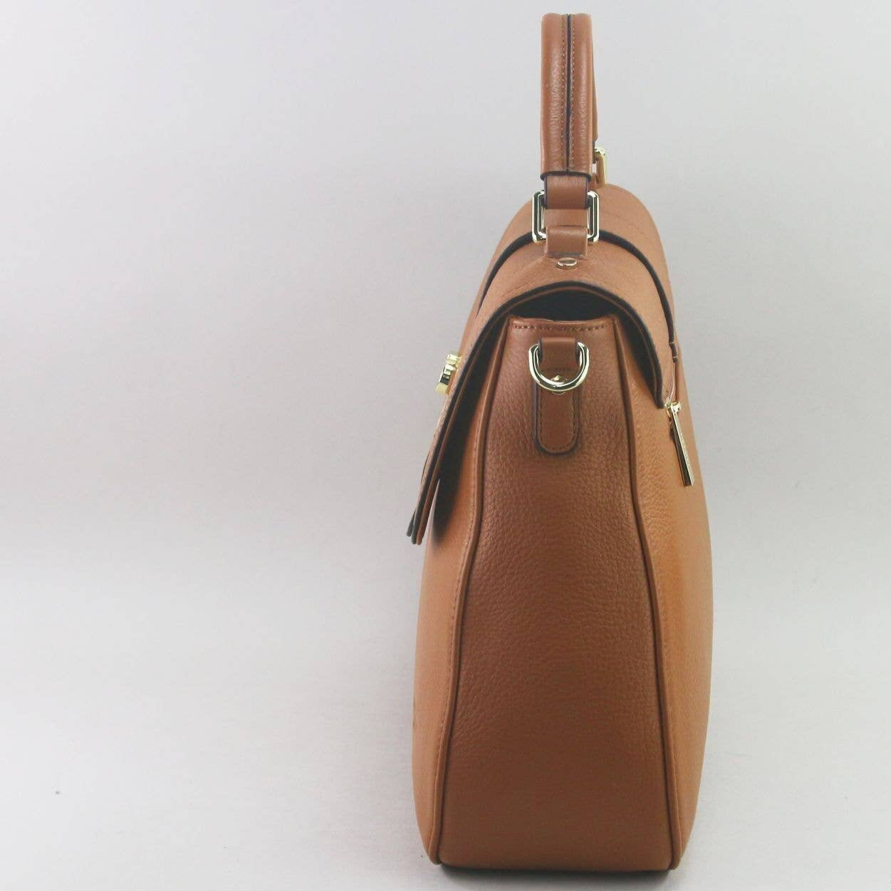 Brown leather laptop handbag on a light grey background