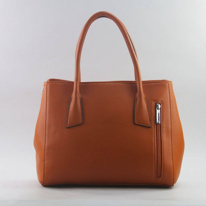 Orange leather laptop handbag with a visible silver zipper on a light grey background